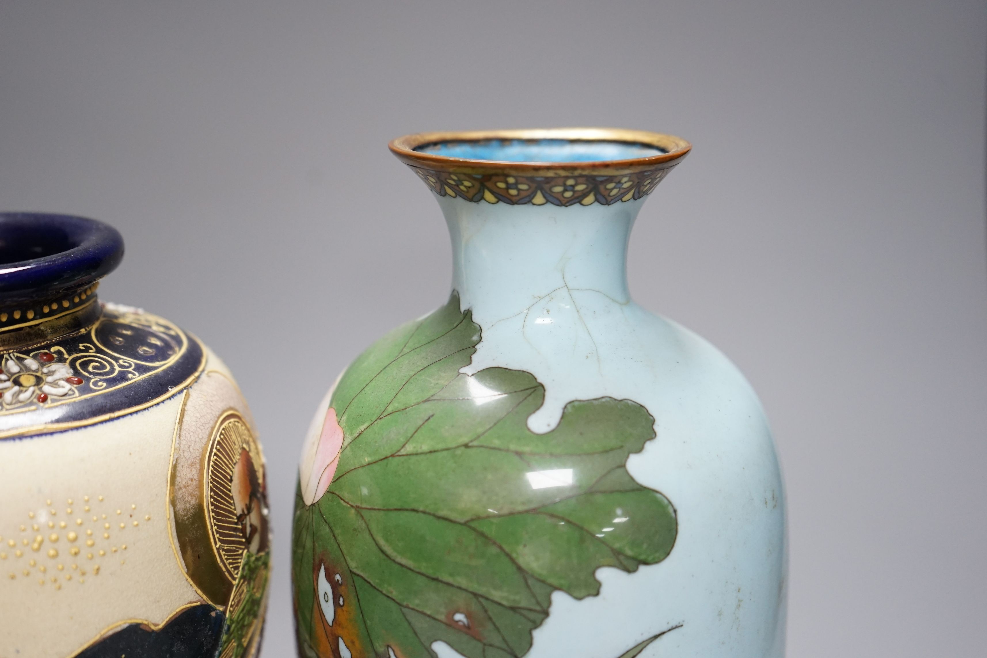 A pair of Japanese cloisonné enamel vases and a Satsuma vase (3), cloisonné vases 24cms high